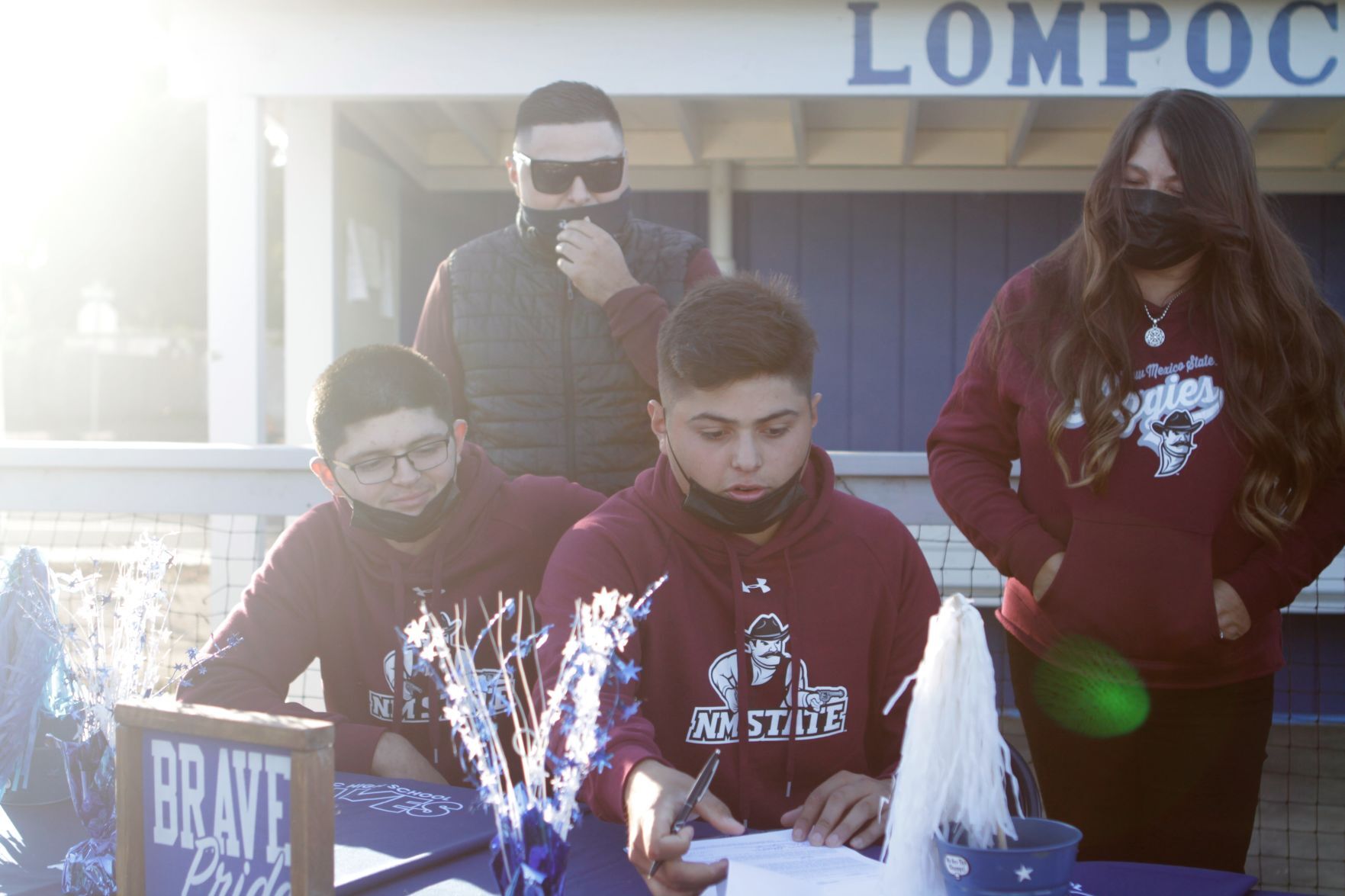 111220 Espinoza signs 11.JPG